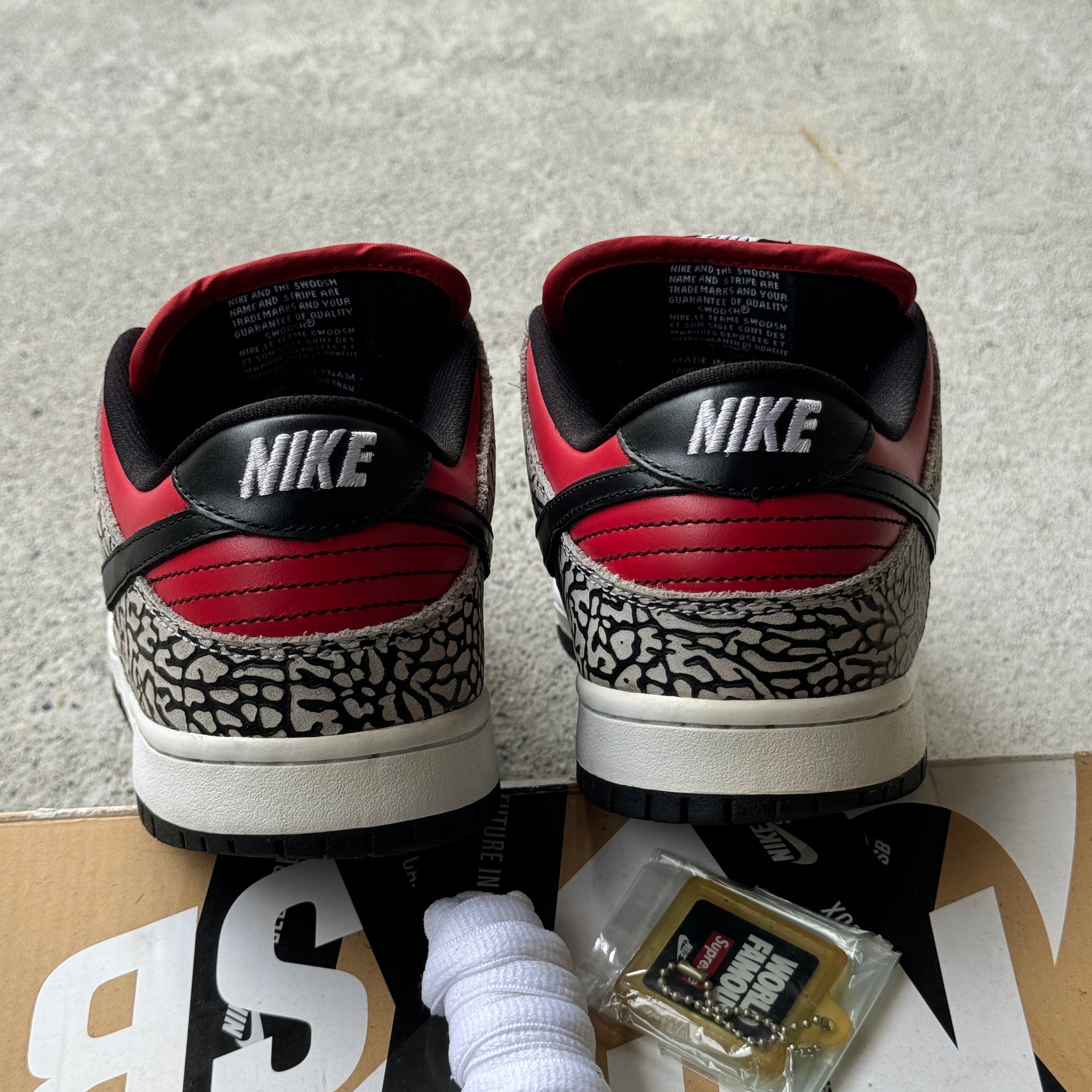 8.5 US - NIKE SB DUNK LOW SUPREME RED CEMENT W BOX 2012