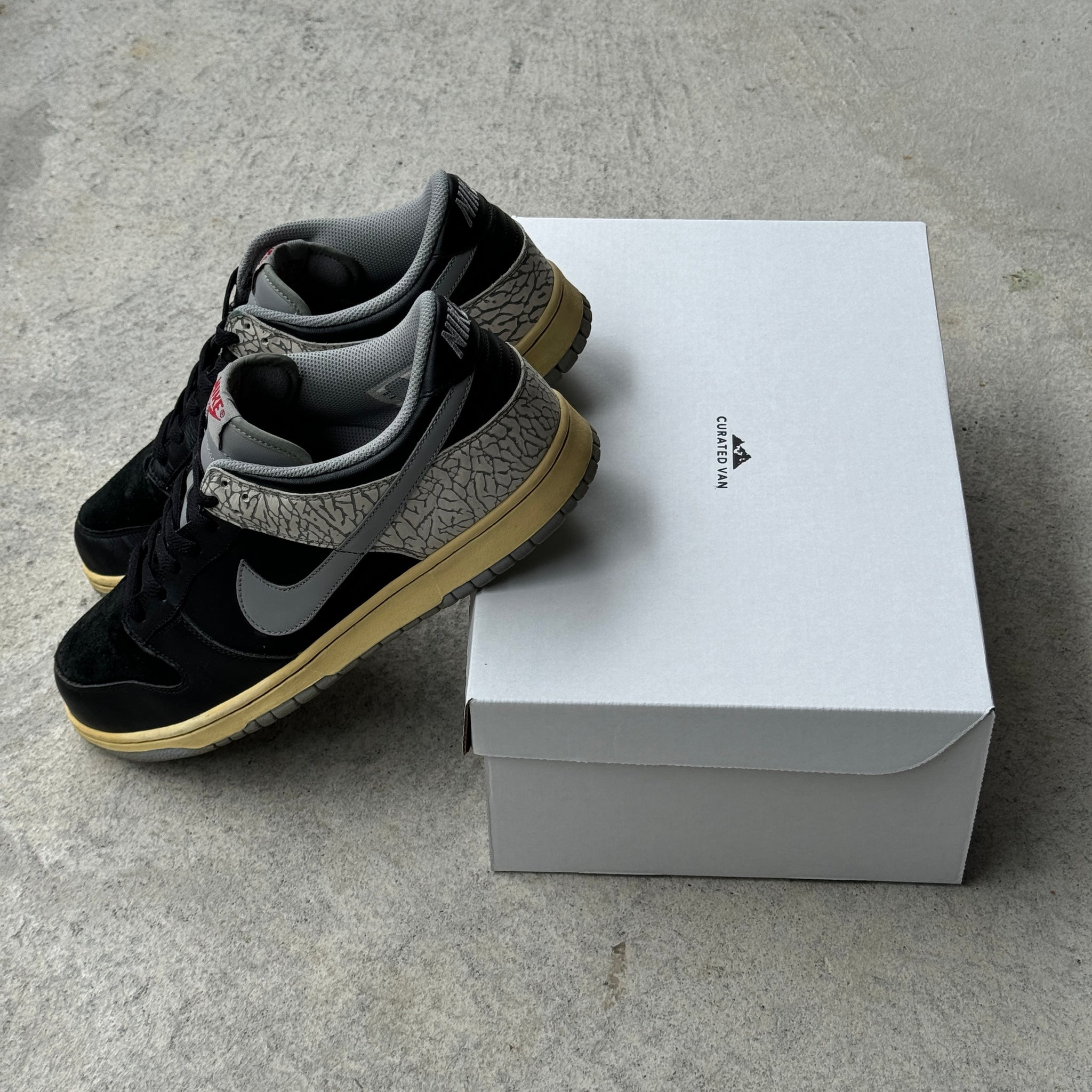 12 US - NIKE DUNK LOW CL JPACK BLACK CEMENT 2009